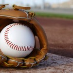 Baseball & Glove on Baseball Field