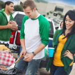 College football fans grilling/tailgating at stadium