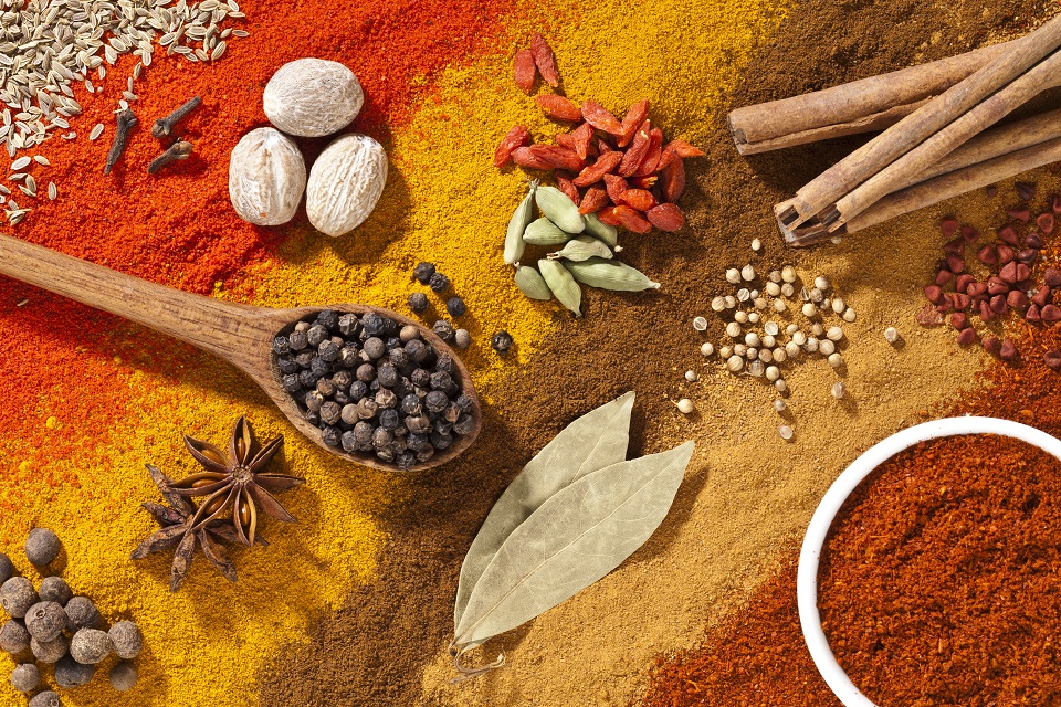 Colorful exotic spices composition shot directly above