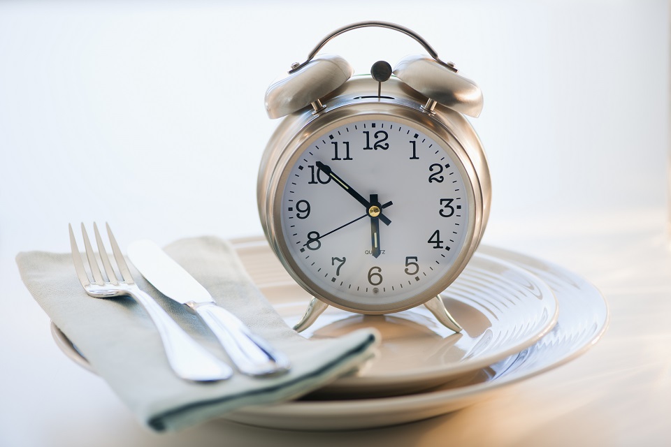 Alarm clock on plate