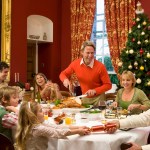Three generation family and friends having Christmas dinner,