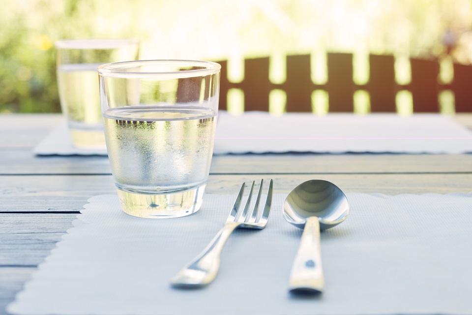 Refreshing outdoor restaurant table setting