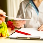 Vegetable diet nutrition and medication concept. Nutritionist offers healthy vegetables diet.