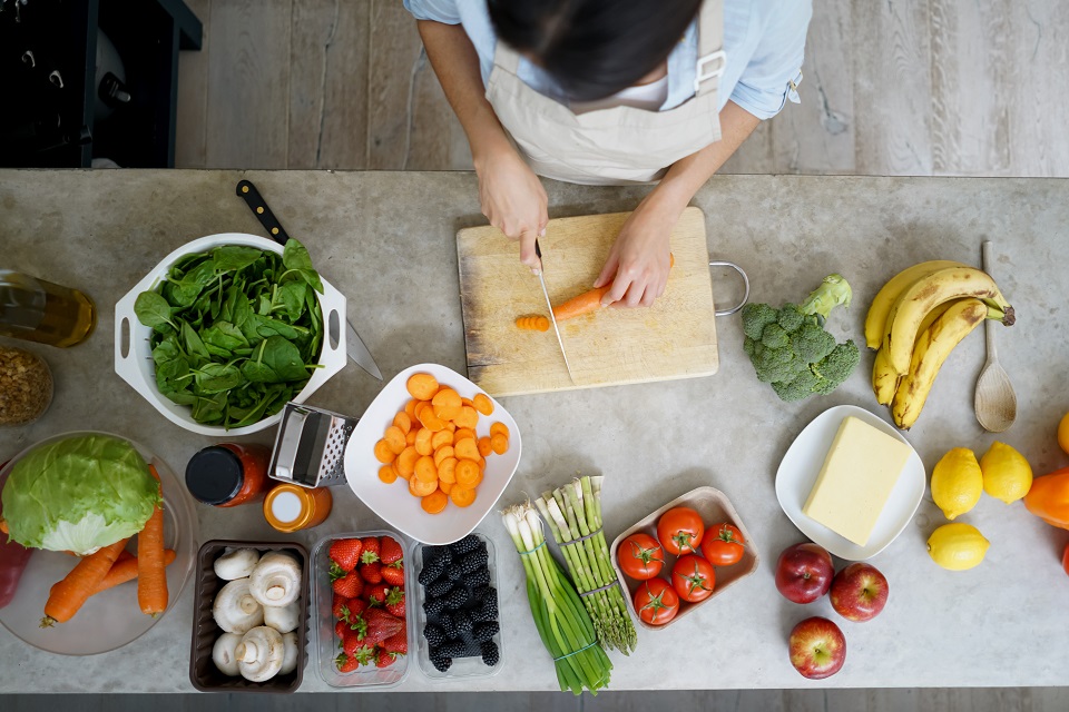 Close-up on a woman cooking at home