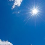 Blue sky with sun shining