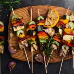 Colorful grilled summer seasonal vegetables skewers