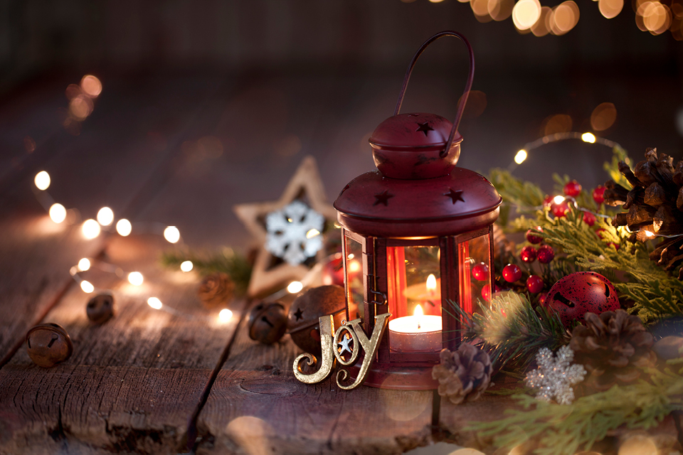 Wooden table with holiday lights and ornaments