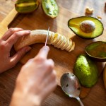 Young woman making a healthy smoothie