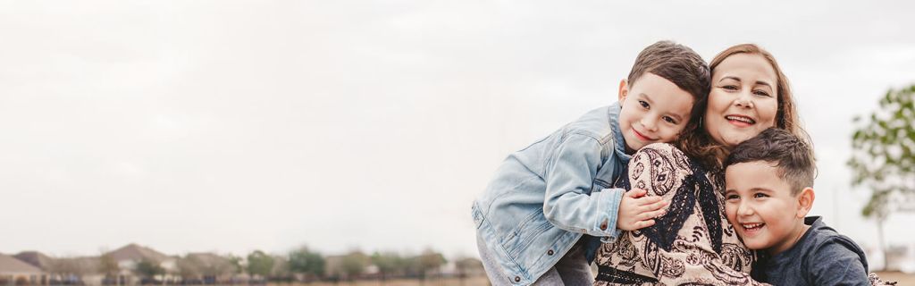 Mom smiling with children