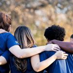 friends linking arms