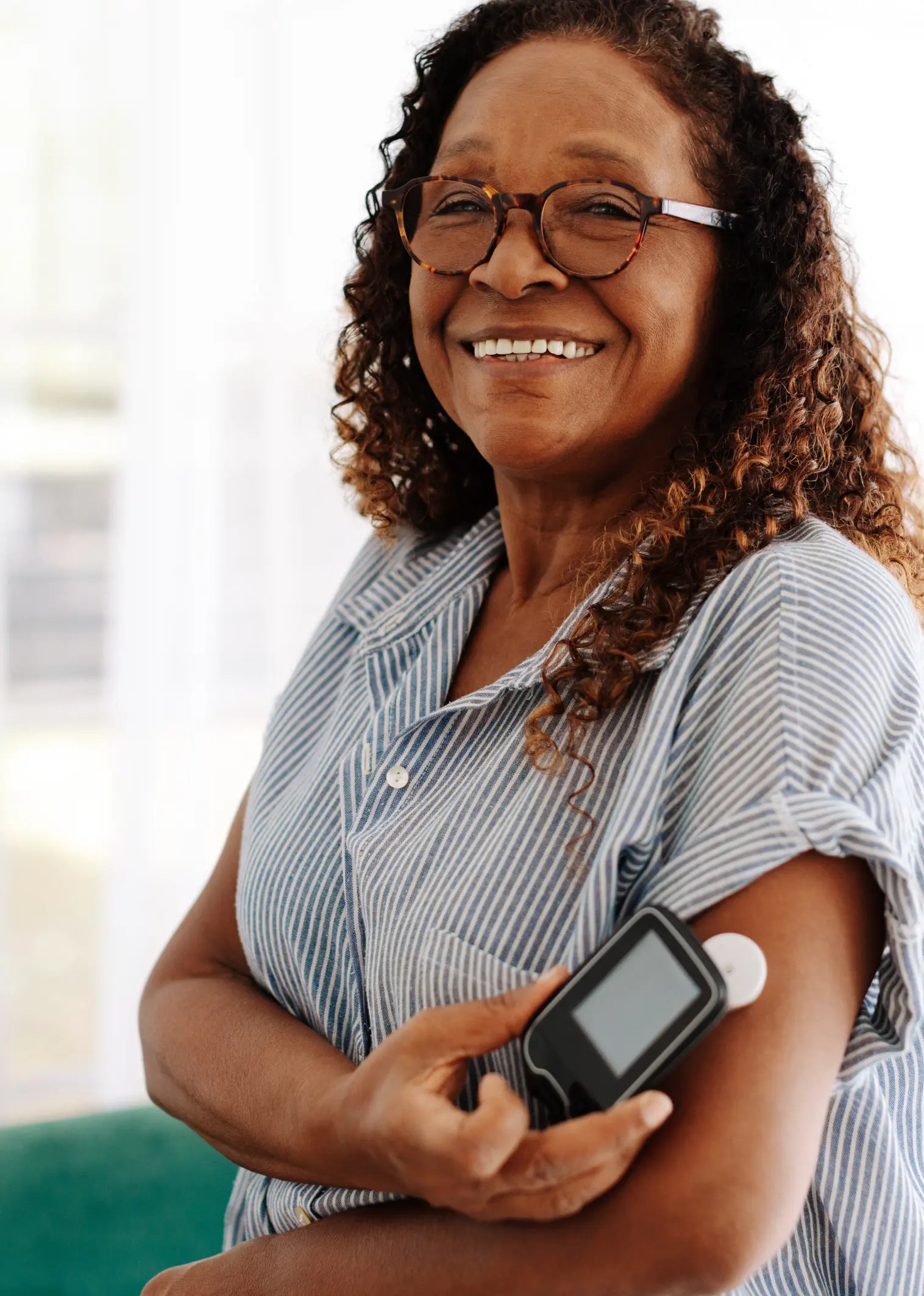 Woman with glucose monitor